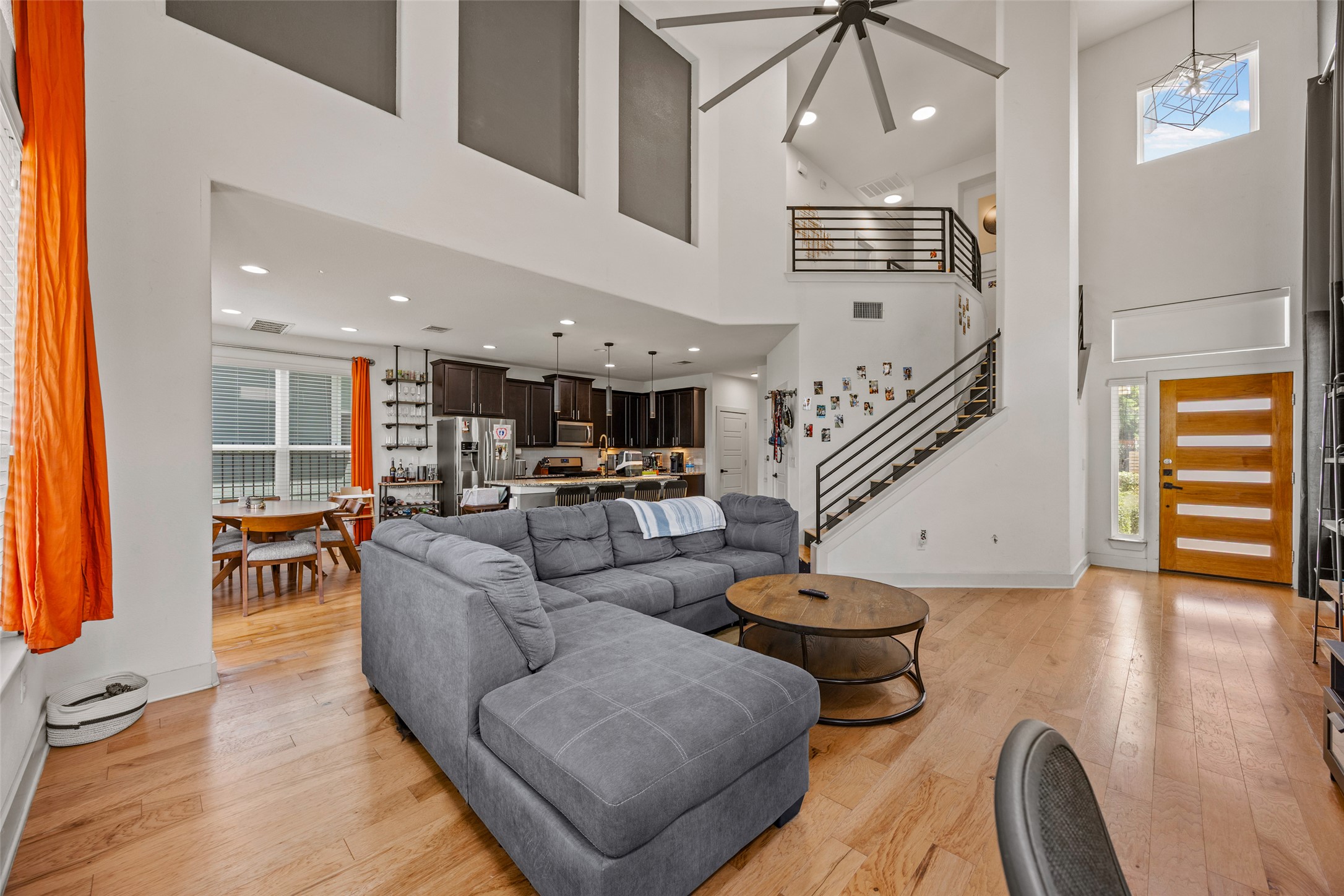 1408 Homespun Road Austin, TX 78745 - Photo 5 of 20 An open concept living space featuring high ceilings and beautiful hardwood floors.