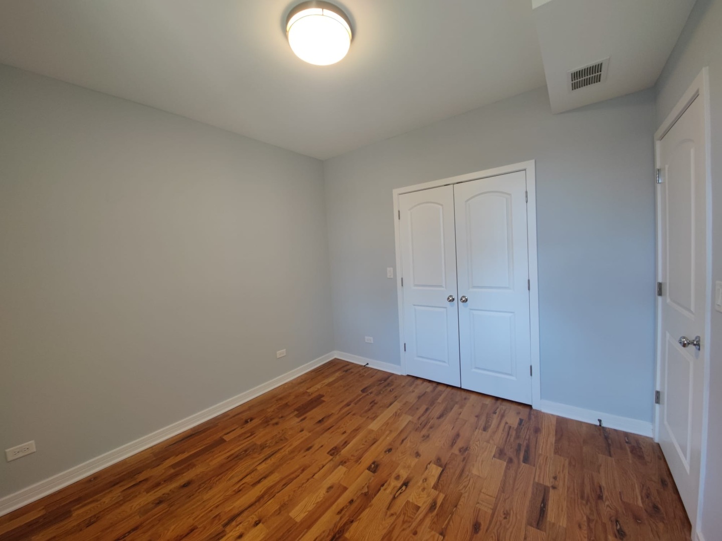 4201 West Division Street, Unit 2 Chicago, IL 60651 - Photo 2 of 7 wooden floor in a room