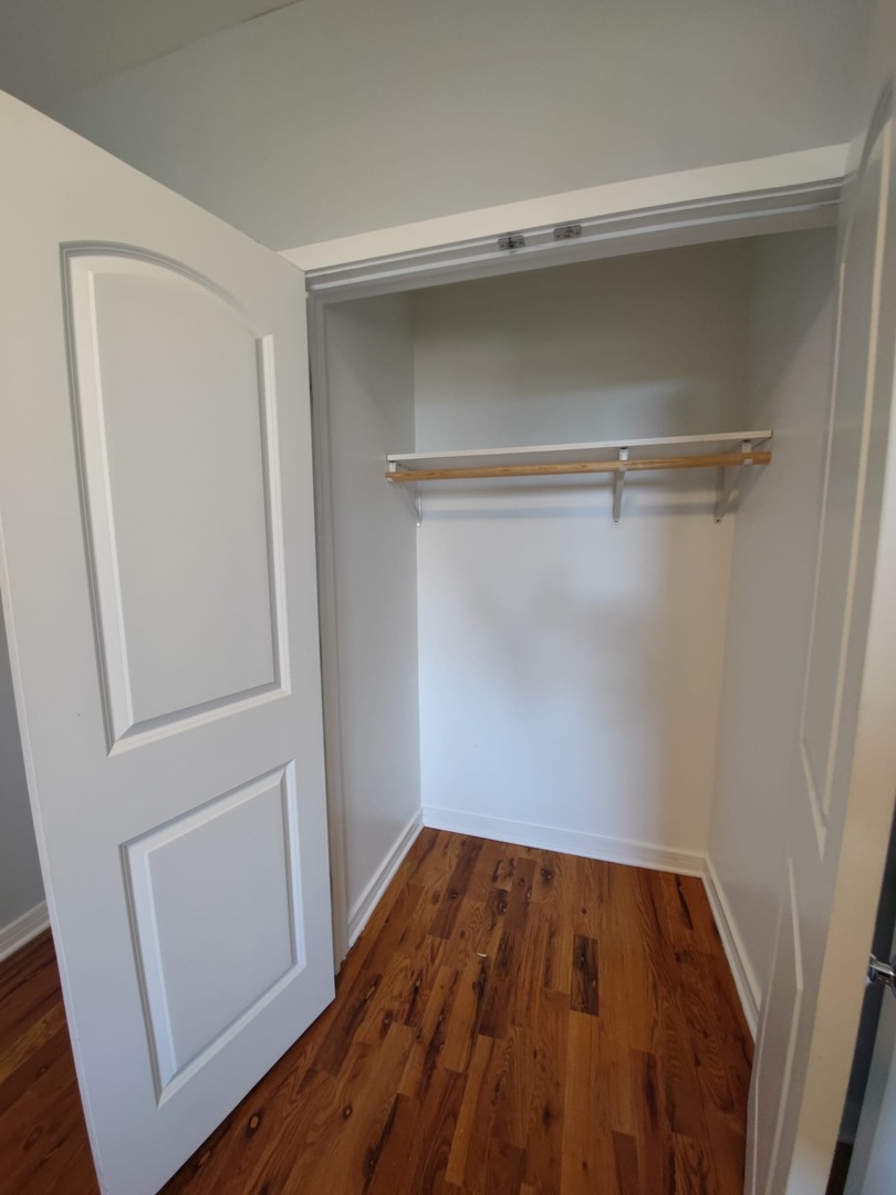 4201 West Division Street, Unit 2 Chicago, IL 60651 - Photo 4 of 7 a view of a room with wooden floor
