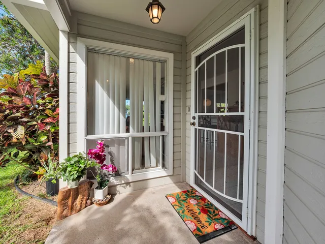 a front view of a house with wooden floor