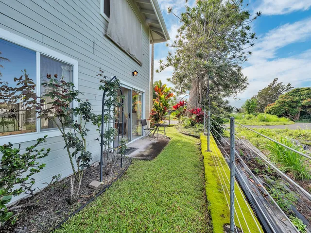 a view of a swimming pool with sitting area