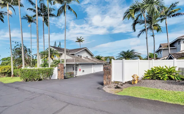 a house with a garden and pool