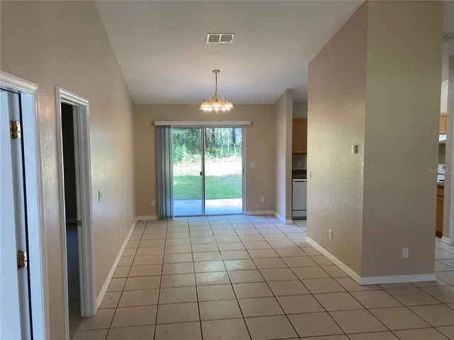 a kitchen with a stove and a sink