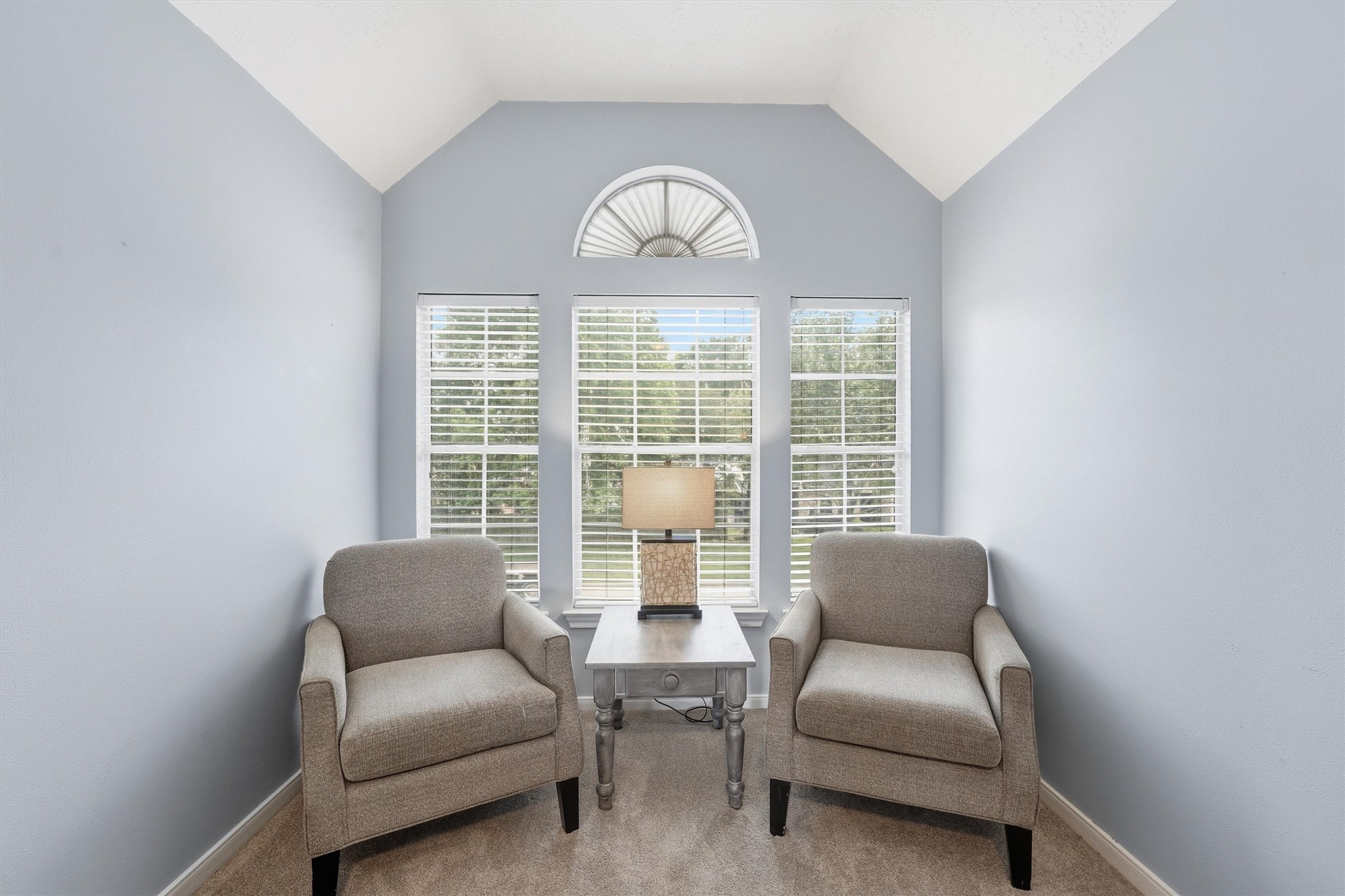 8827 Mile Run Road Humble, TX 77346 - Photo 19 of 37 a living room with furniture and a large window