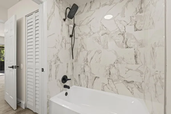 a bathroom with a bathtub