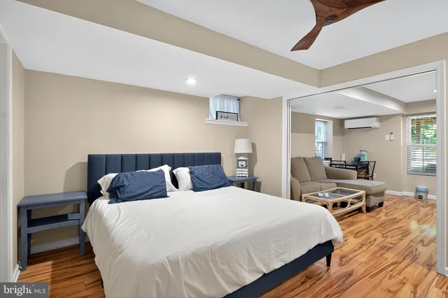 a bathroom with a sink a toilet and a shower