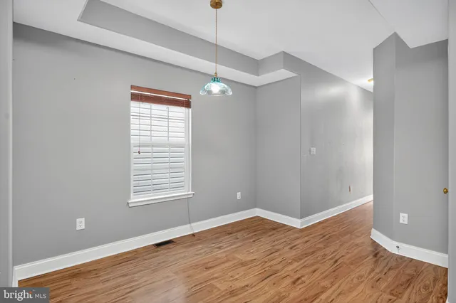 a view of a porch with wooden floor and outdoor space
