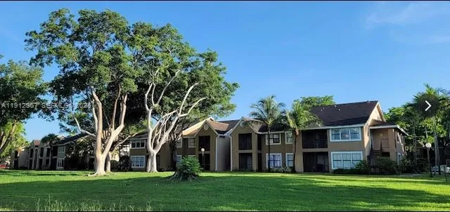 front view of house with a yard