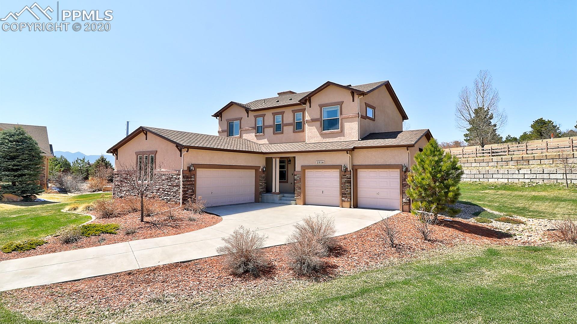 2316 Rusty Ridge Court Colorado Springs, CO 80921 - Photo 1 of 46 Large home in Flying Horse with a 4 car garage and large half acre lot.