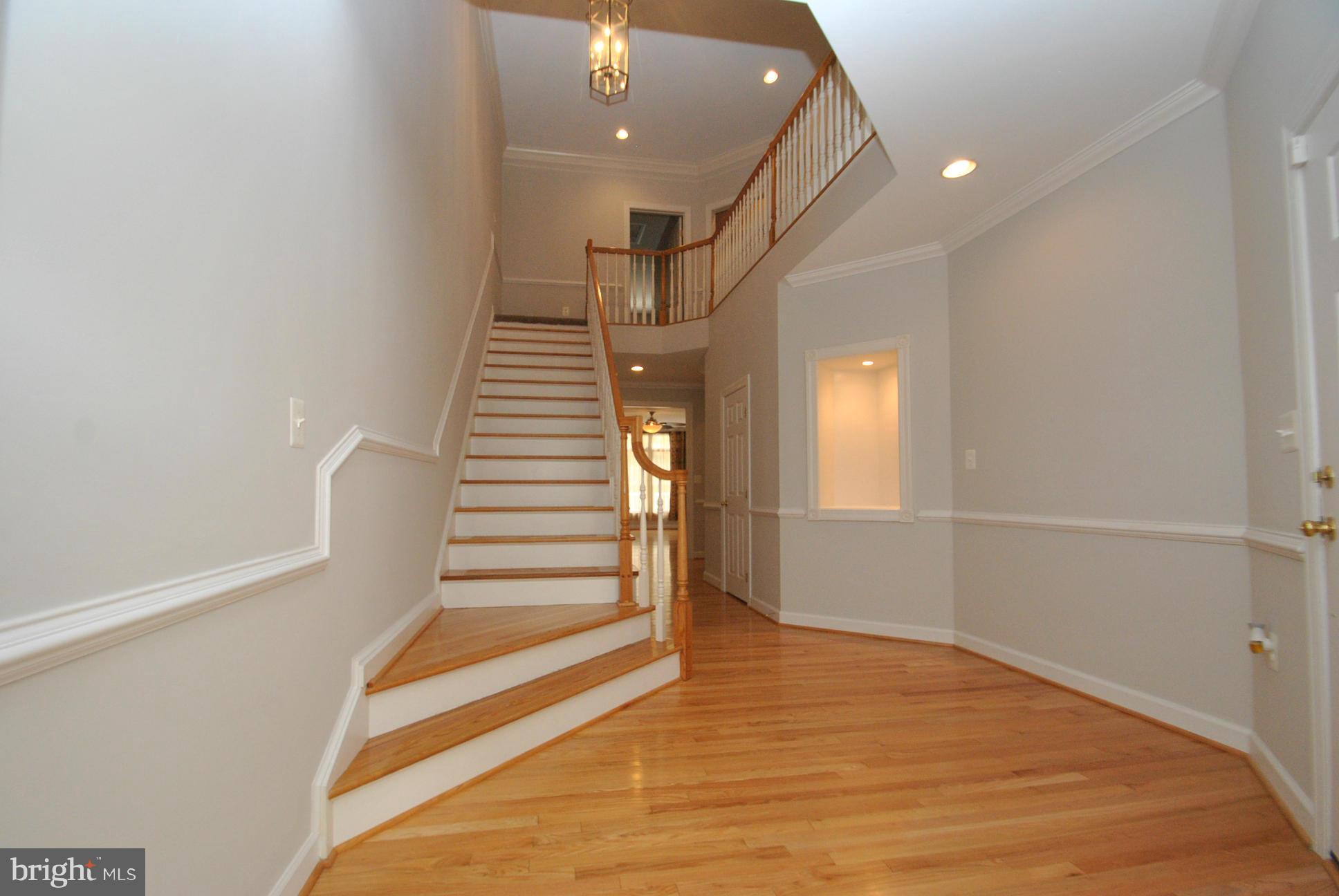 5113 Bright Owl Road Perry Hall, MD 21128 - Photo 3 of 30 GRAND 2 STORY FOYER STAIRCASE ENTRANCE