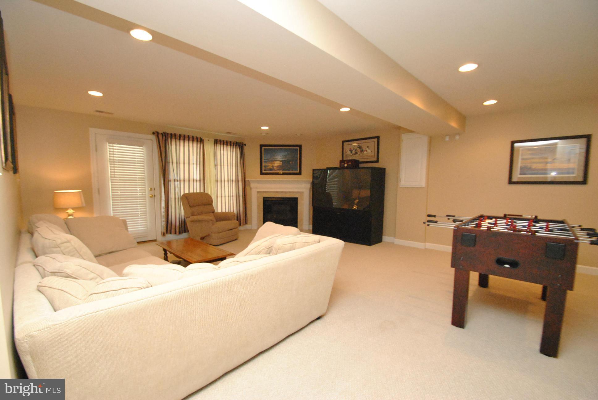 5113 Bright Owl Road Perry Hall, MD 21128 - Photo 20 of 30 FULLY FINISHED REC ROOM W/FIREPLACE