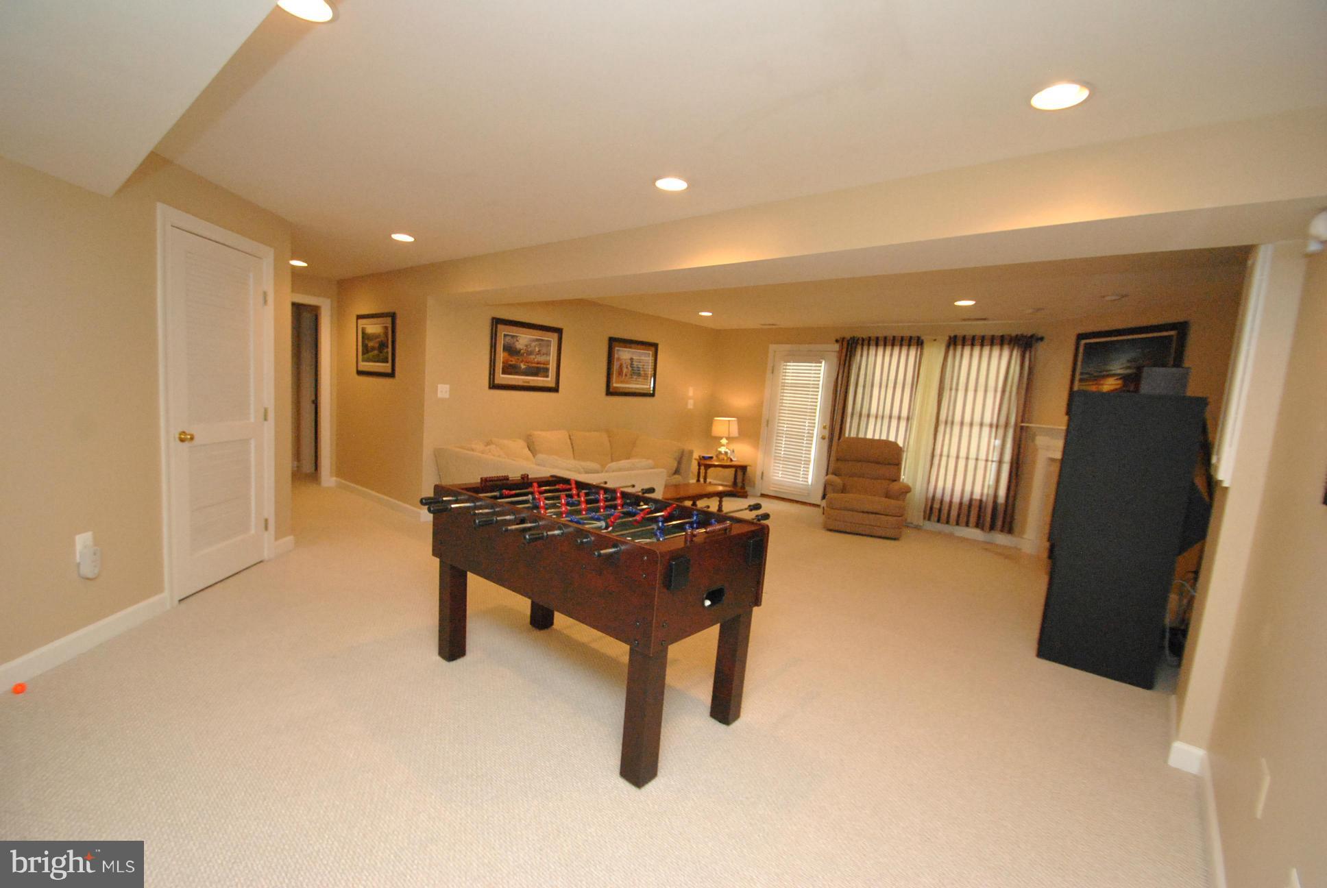 5113 Bright Owl Road Perry Hall, MD 21128 - Photo 21 of 30 FULLY FINISHED REC ROOM W/FIREPLACE