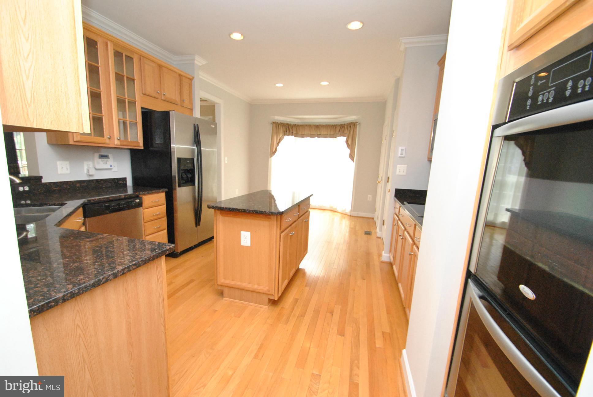 5113 Bright Owl Road Perry Hall, MD 21128 - Photo 7 of 30 GOURMET GRANITE KITCHEN W/DOUBLE OVEN & ISLAND
