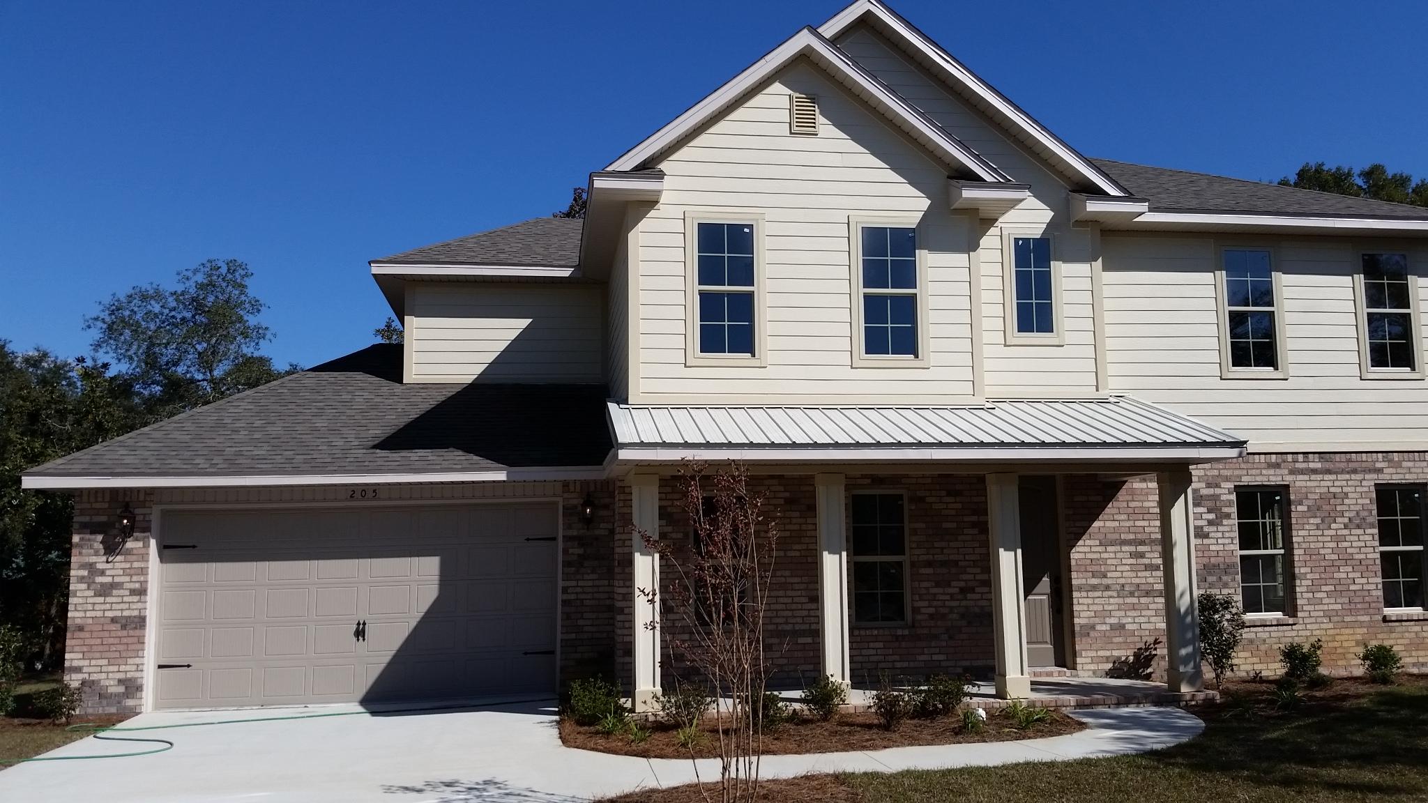 205 Rigdon Court Northwest Fort Walton Beach, FL 32548 - Photo 1 of 48 a front view of a house