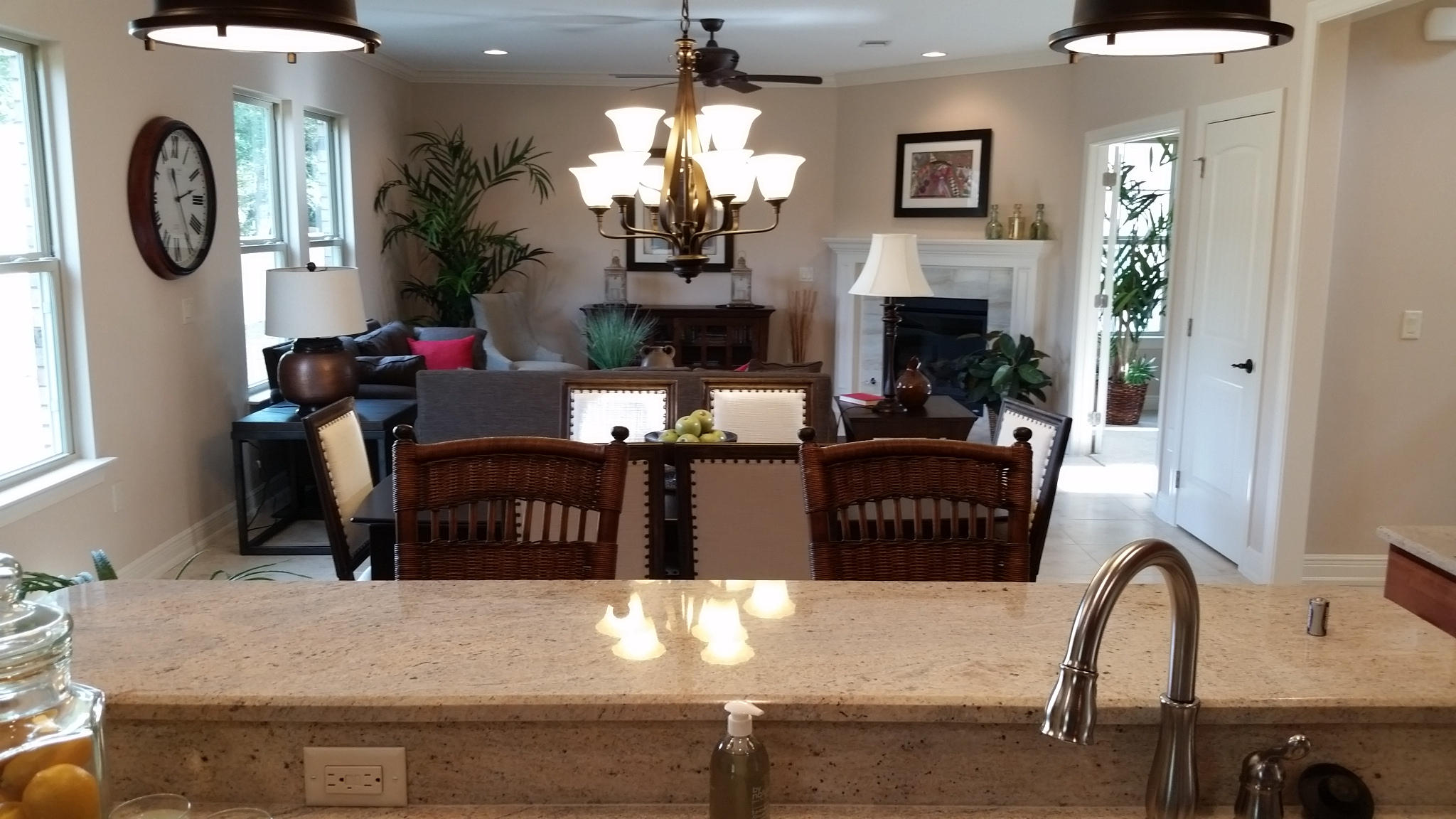 205 Rigdon Court Northwest Fort Walton Beach, FL 32548 - Photo 14 of 48 a living room with furniture a fireplace and a chandelier