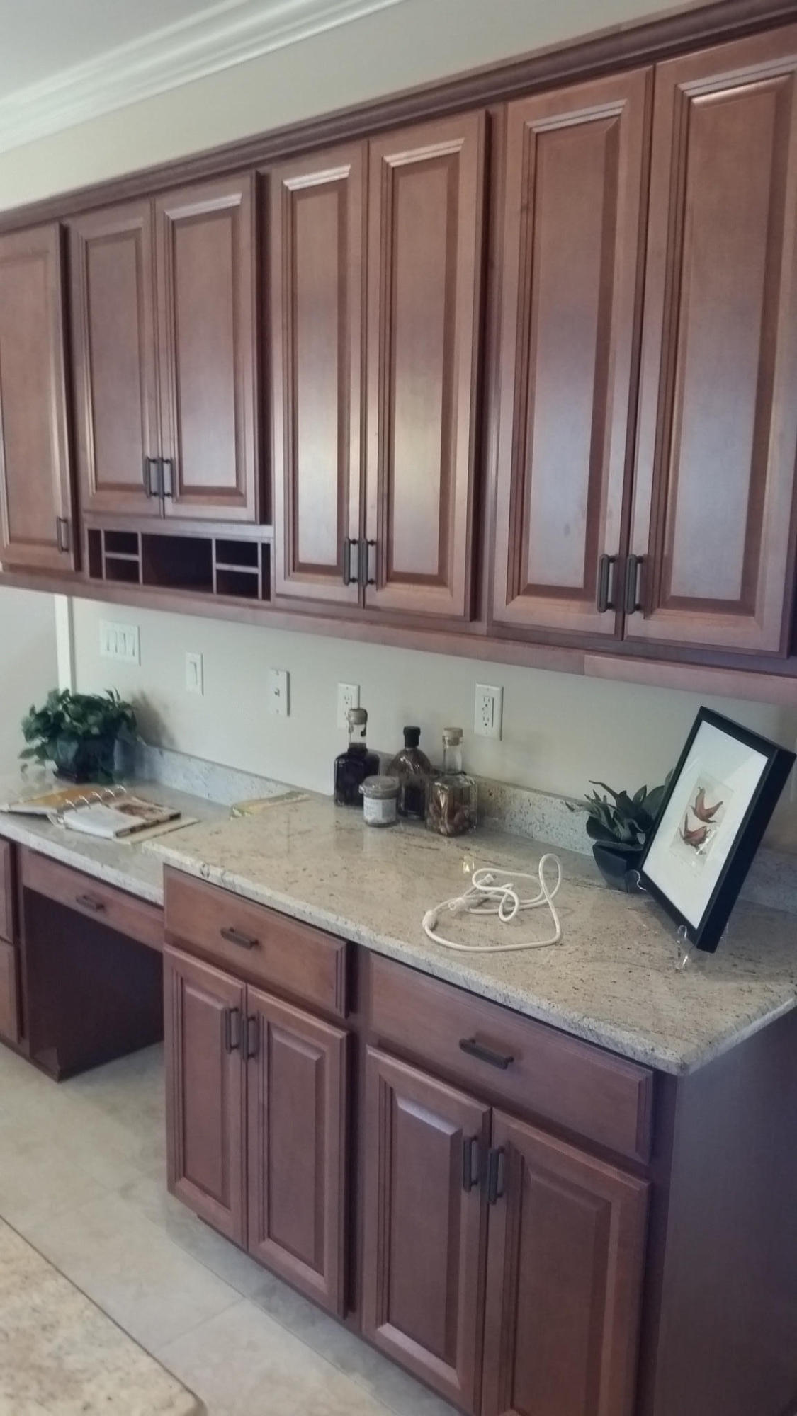 205 Rigdon Court Northwest Fort Walton Beach, FL 32548 - Photo 15 of 48 a kitchen with stainless steel appliances granite countertop wooden cabinets a sink and dishwasher