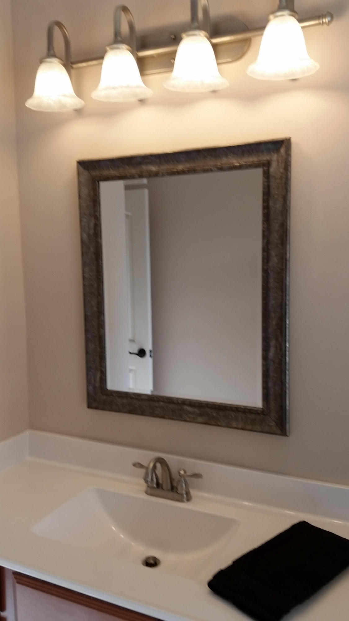 205 Rigdon Court Northwest Fort Walton Beach, FL 32548 - Photo 18 of 48 a bathroom with a sink and a mirror
