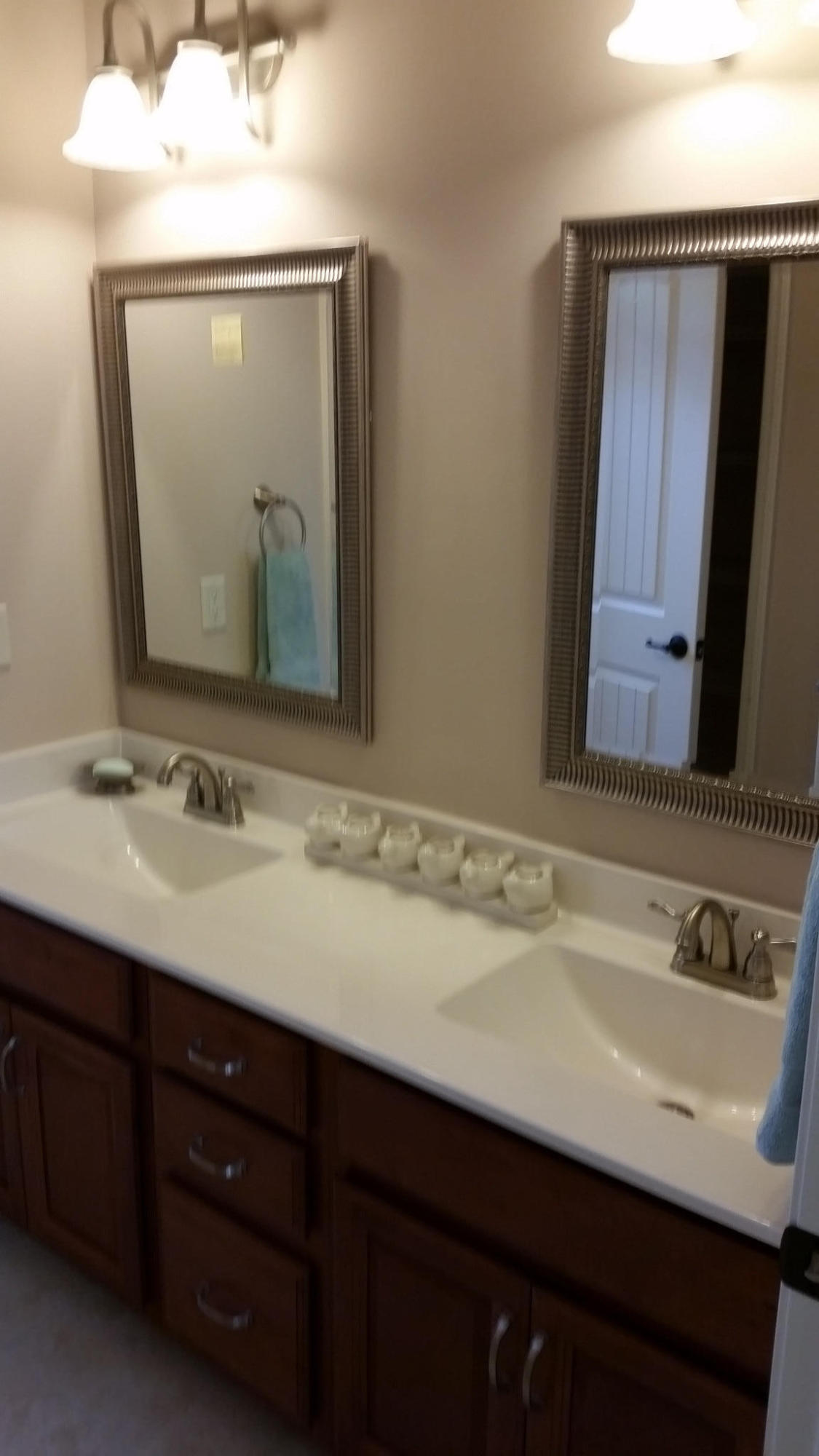 205 Rigdon Court Northwest Fort Walton Beach, FL 32548 - Photo 36 of 48 a bathroom with a sink vanity and a mirror