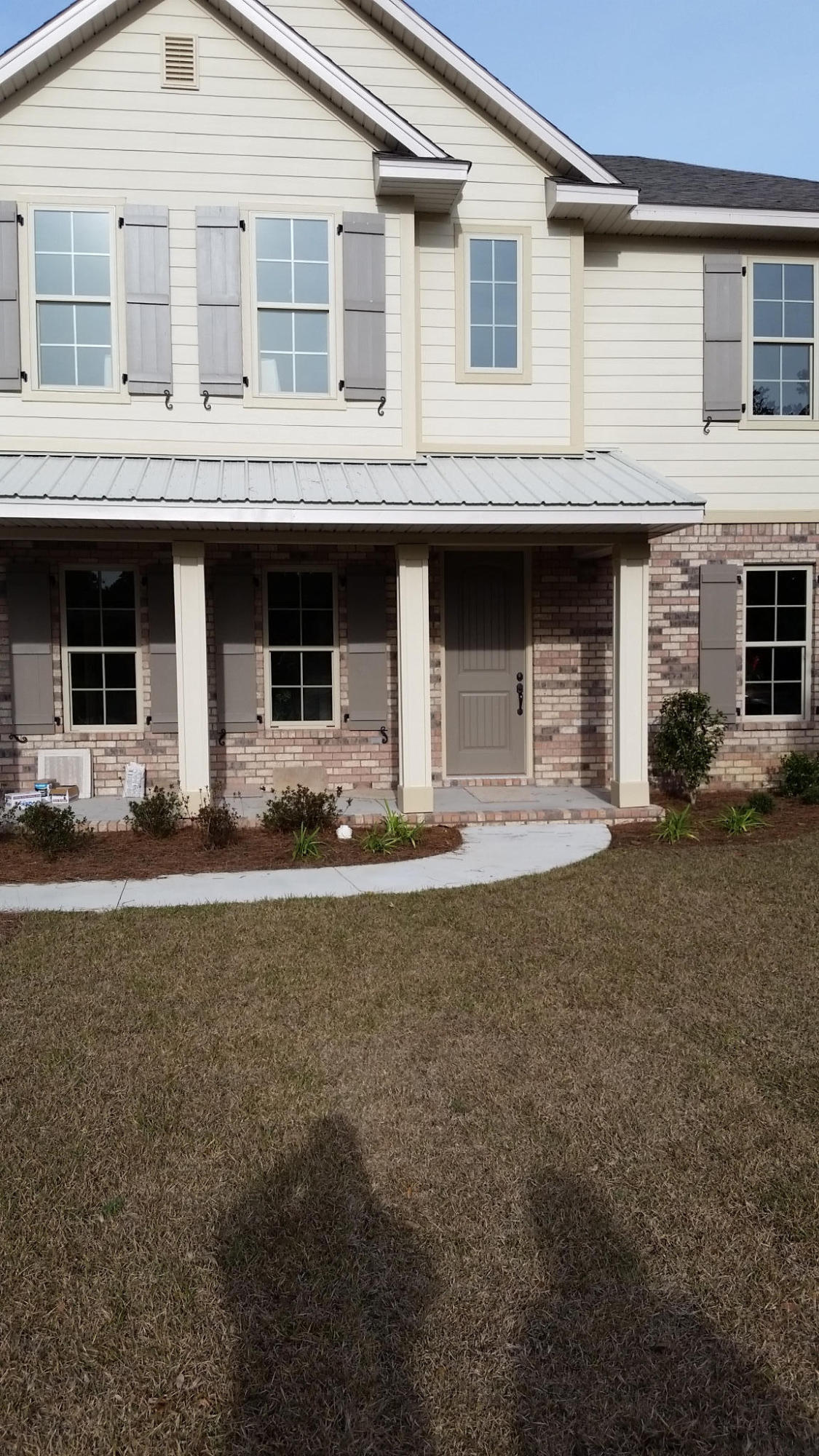 205 Rigdon Court Northwest Fort Walton Beach, FL 32548 - Photo 44 of 48 a front view of a house with garage