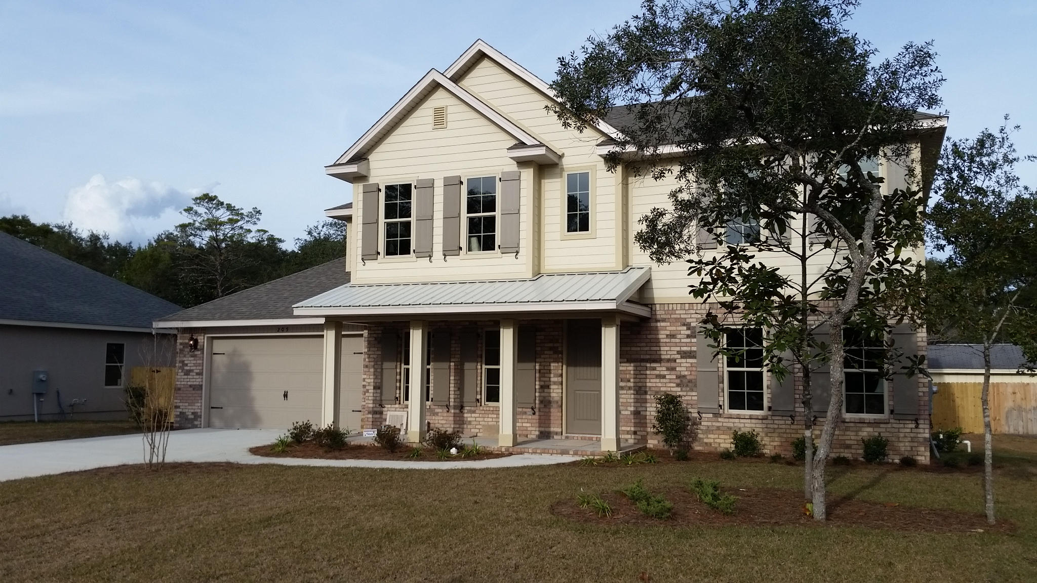 205 Rigdon Court Northwest Fort Walton Beach, FL 32548 - Photo 48 of 48 a front view of a house with a yard