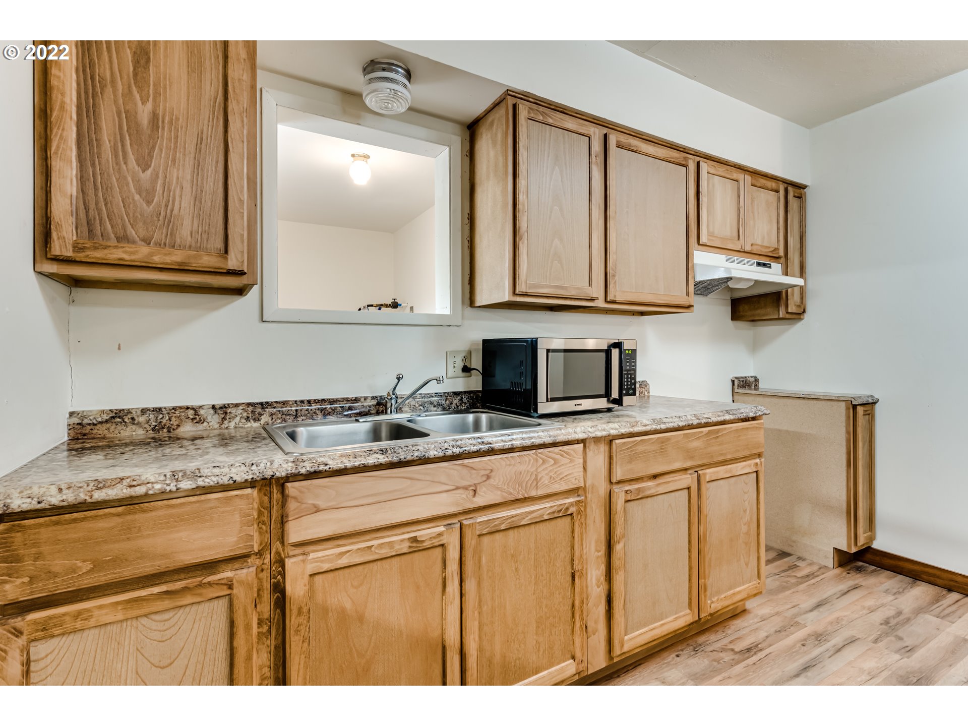2760 Garson Lane Springfield, OR 97477 - Photo 3 of 19 a kitchen with granite countertop a sink cabinets and stainless steel appliances