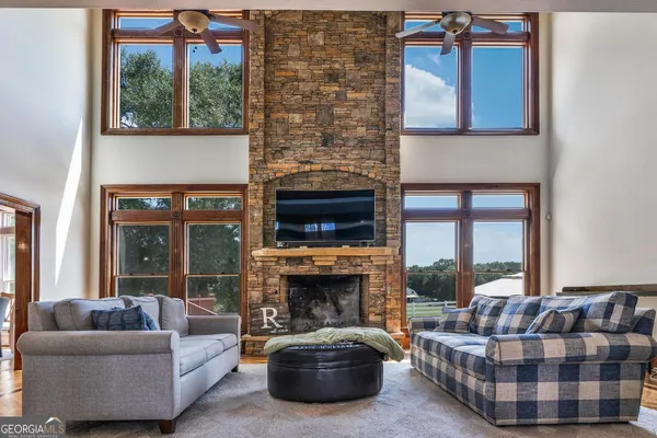 a kitchen with stainless steel appliances granite countertop a refrigerator stove top oven and sink