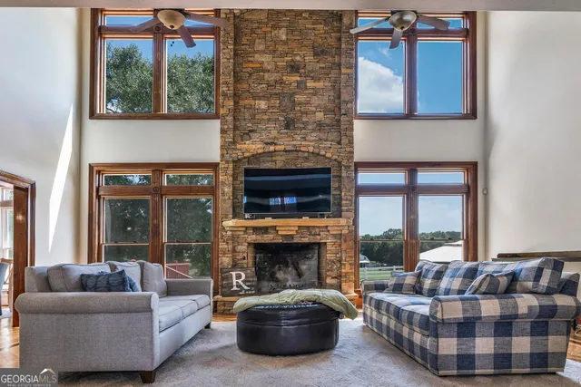 a kitchen with stainless steel appliances granite countertop a refrigerator stove top oven and sink