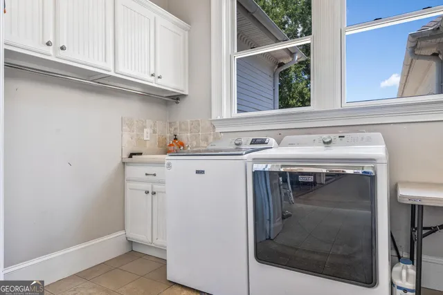 a view of an empty room with a garage