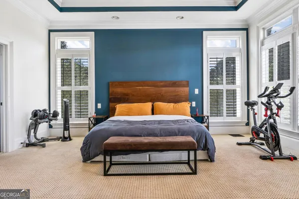 a room with a wooden floor and shoes