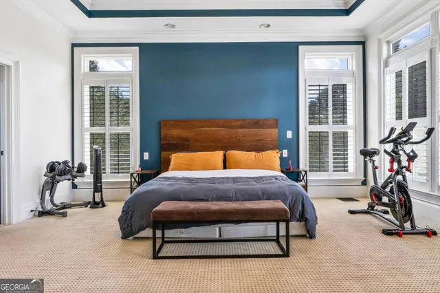 a room with a wooden floor and shoes