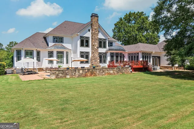 a view of a park with large trees