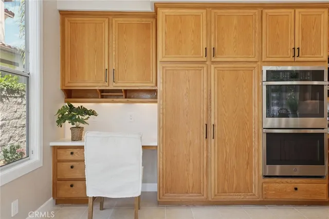 a bathroom with a sink vanity and a mirror