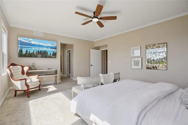 a bathroom with a granite countertop sink mirror and a bathtub