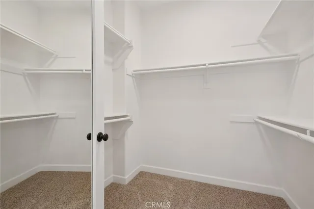 a bathroom with a sink double vanity granite and shower