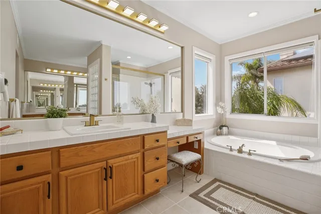 a view of a porch with chairs and backyard