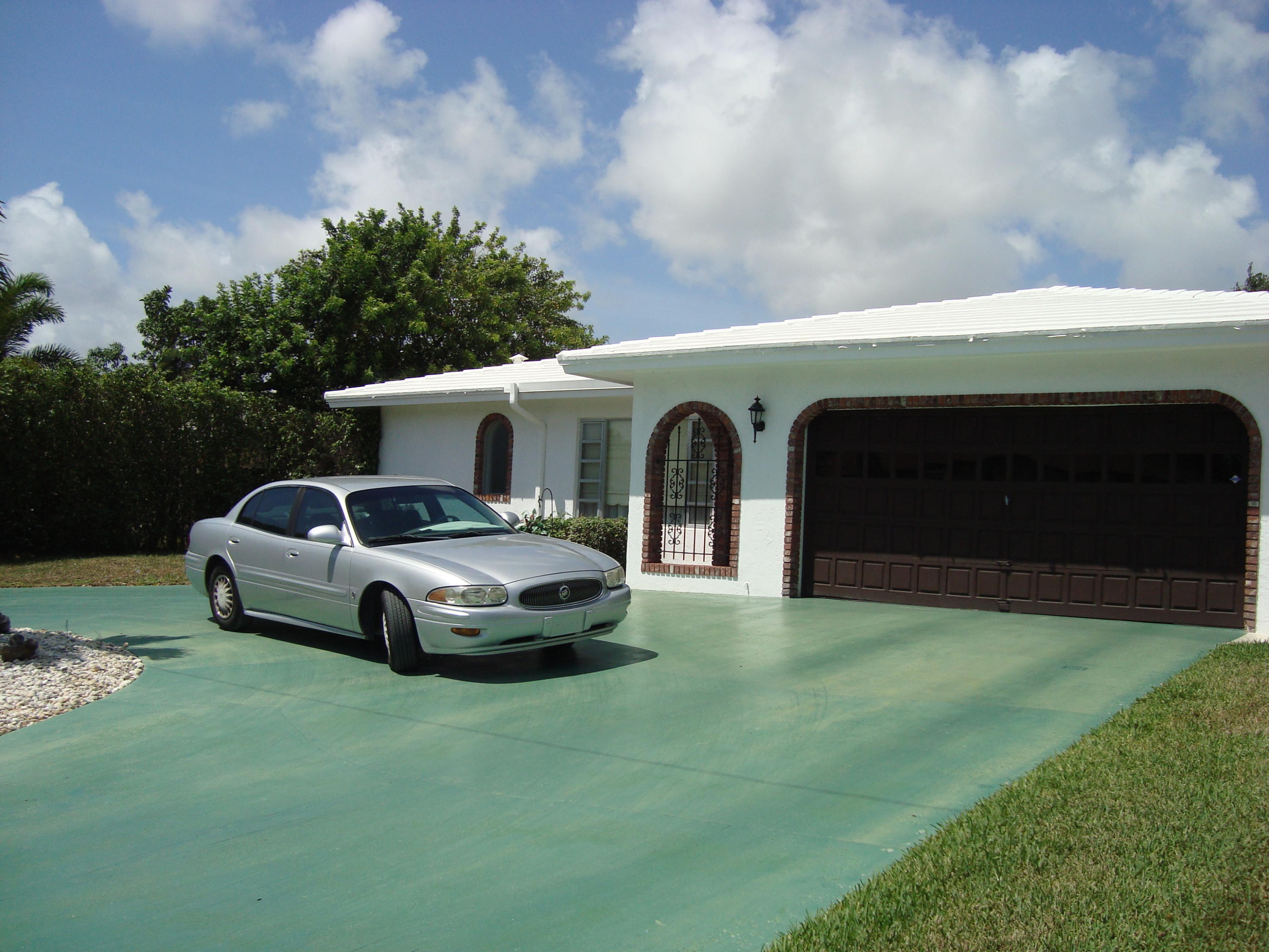 3911 Northwest 4th Court Boca Raton, FL 33431 - Photo 1 of 36 front