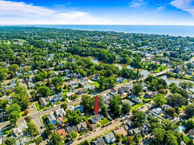 an aerial view of a house with a garden
