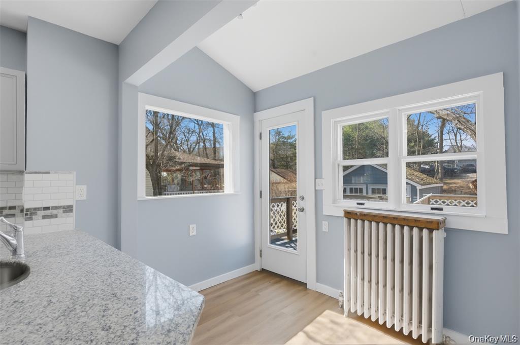 110 Innis Avenue Poughkeepsie, NY 12601 - Photo 9 of 22 an empty room with windows
