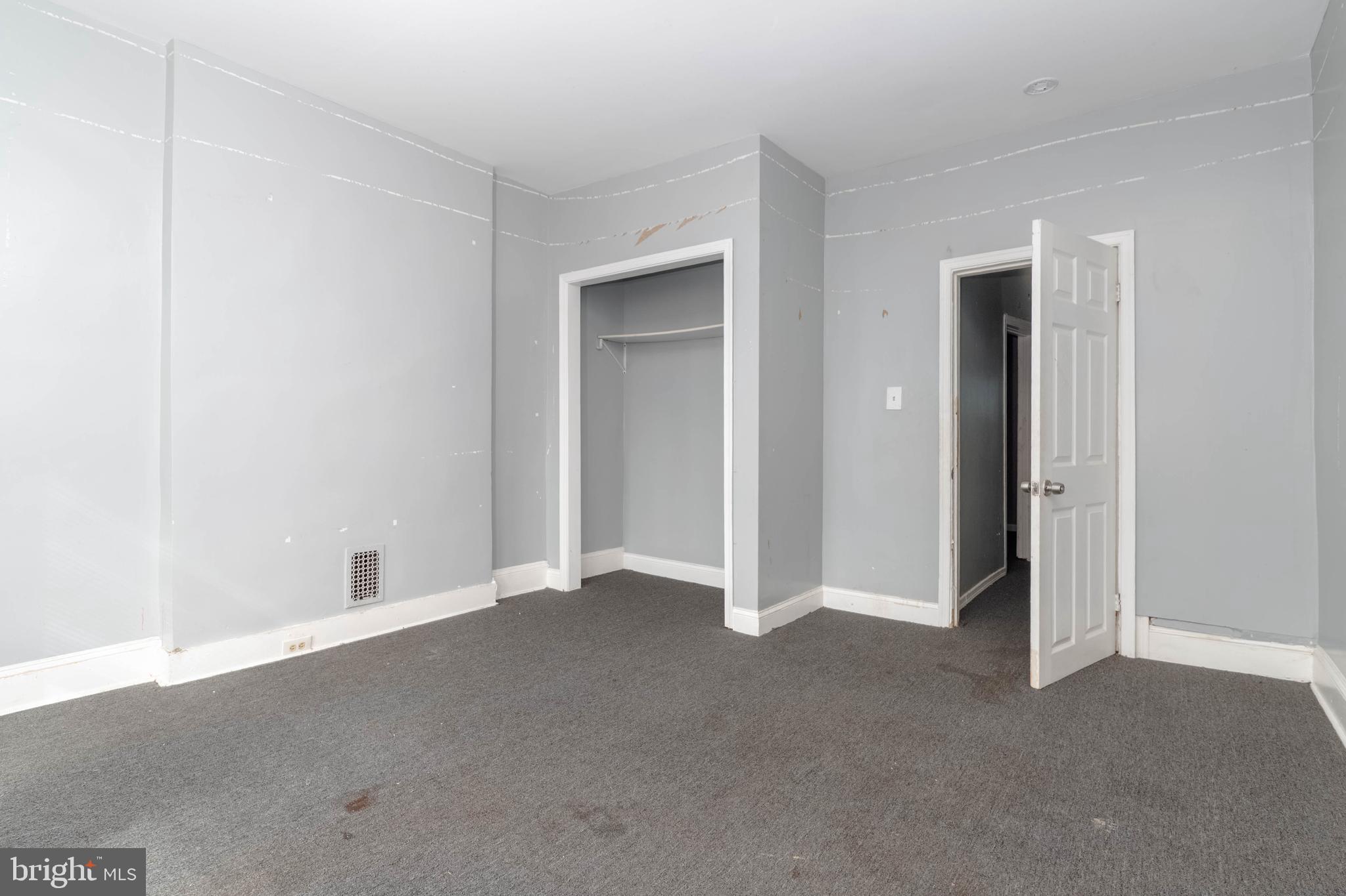 2216 West Fayette Street Baltimore, MD 21223 - Photo 15 of 36 an empty room with closet area