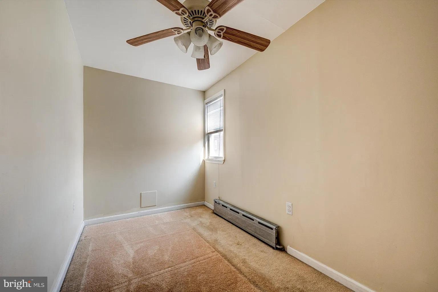3188 Mercer Street Philadelphia, PA 19134 - Photo 12 of 14 Cozy room with natural light and ceiling fan.