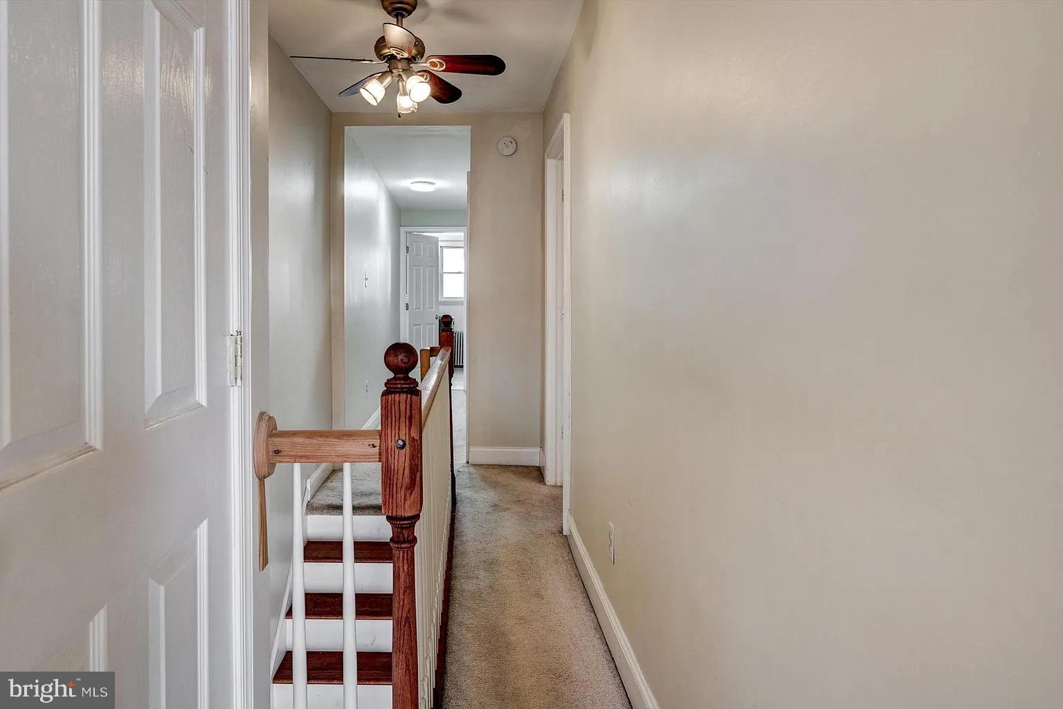 3188 Mercer Street Philadelphia, PA 19134 - Photo 9 of 14 Inviting hallway with warm, natural light.