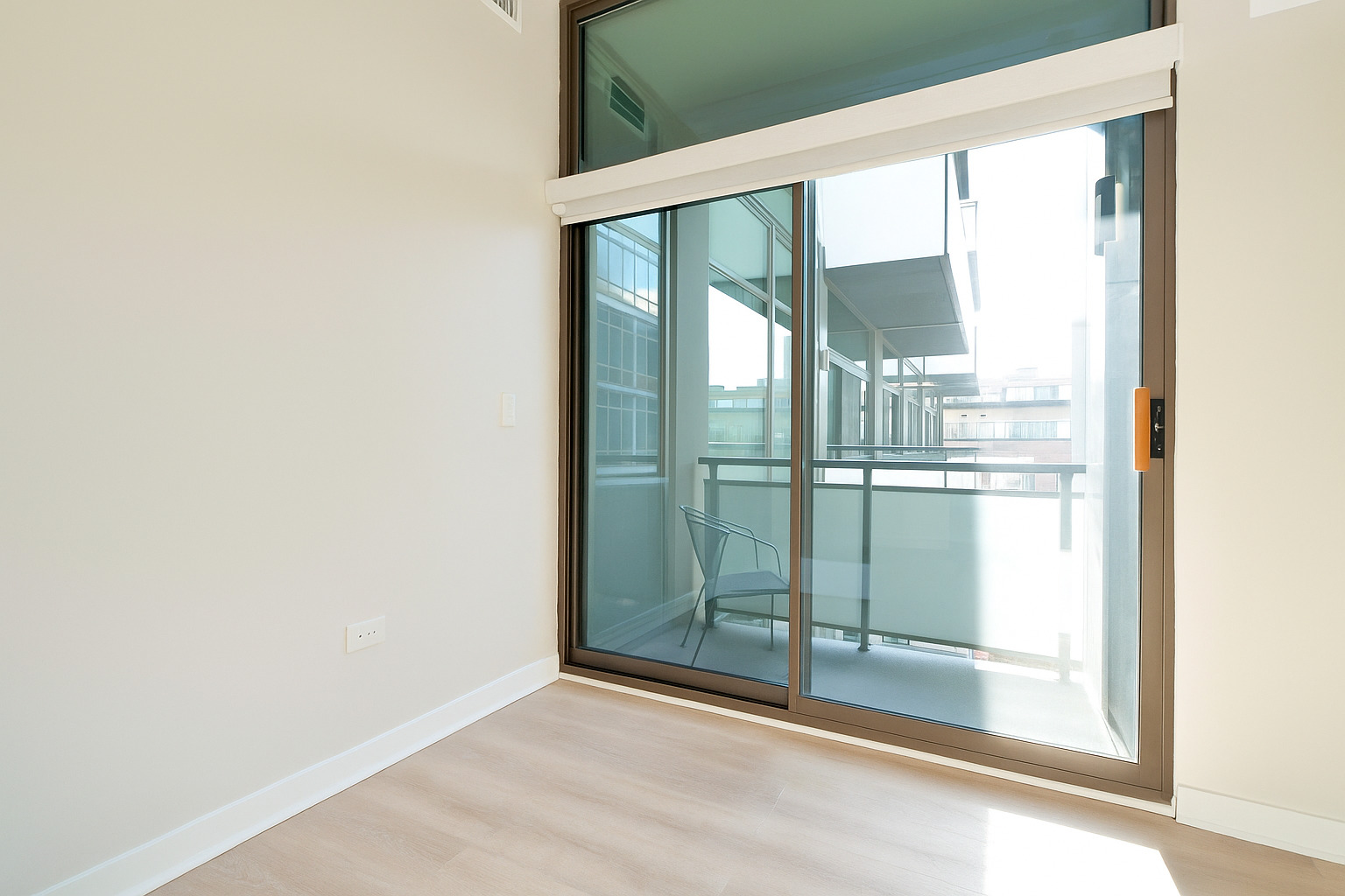 650 West Wayman Street, Unit 508 Chicago, IL 60661 - Photo 14 of 23 a view of a glass door with a yard from the balcony