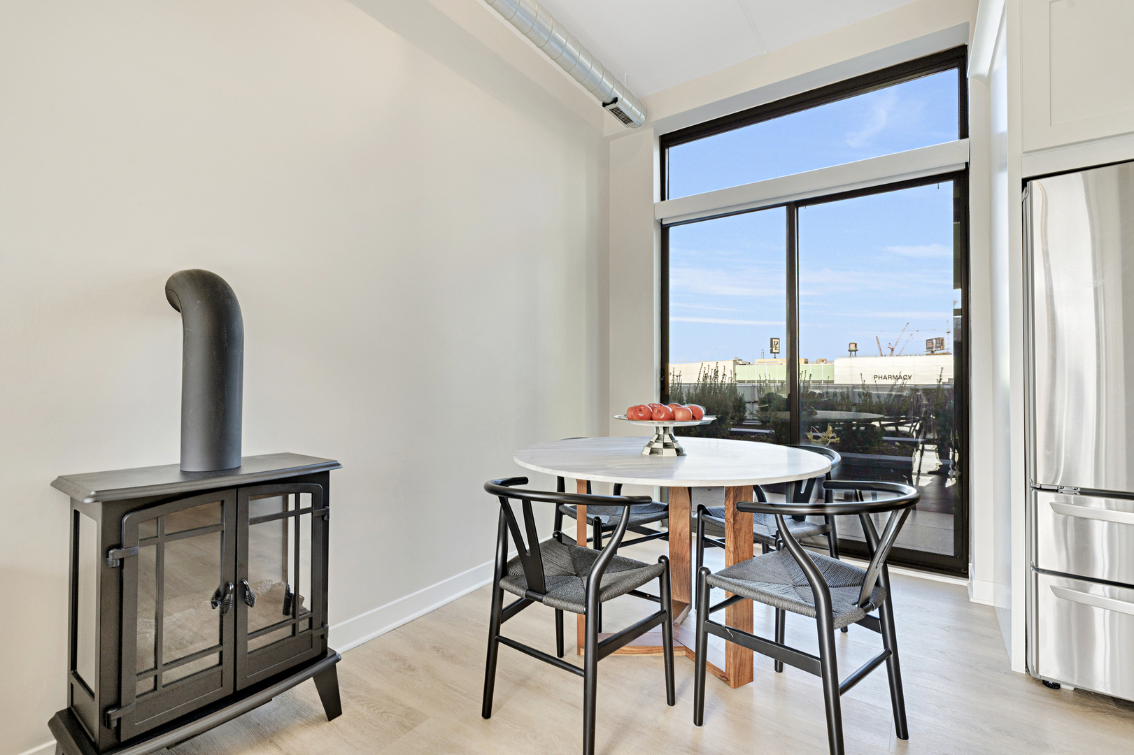 650 West Wayman Street, Unit 508 Chicago, IL 60661 - Photo 4 of 23 a view of a dining room with furniture window and outside view