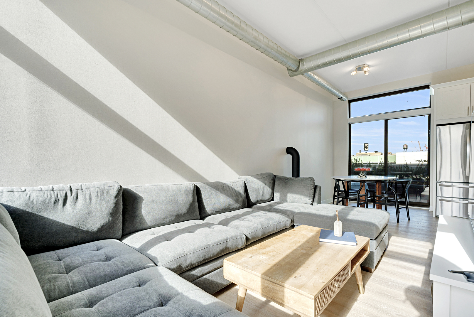 650 West Wayman Street, Unit 508 Chicago, IL 60661 - Photo 5 of 23 a living room with furniture and wooden floor