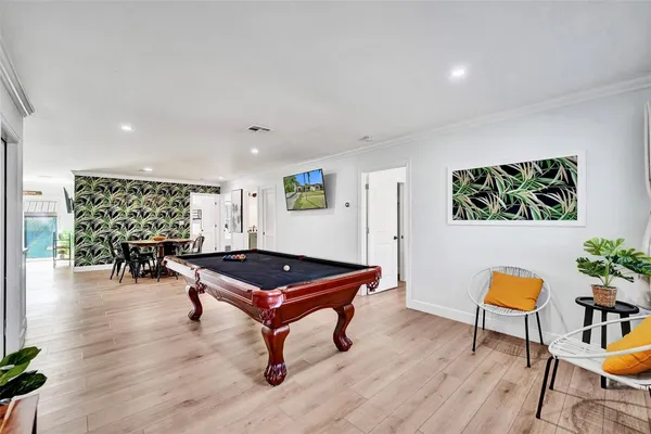 a room with furniture and wooden floor