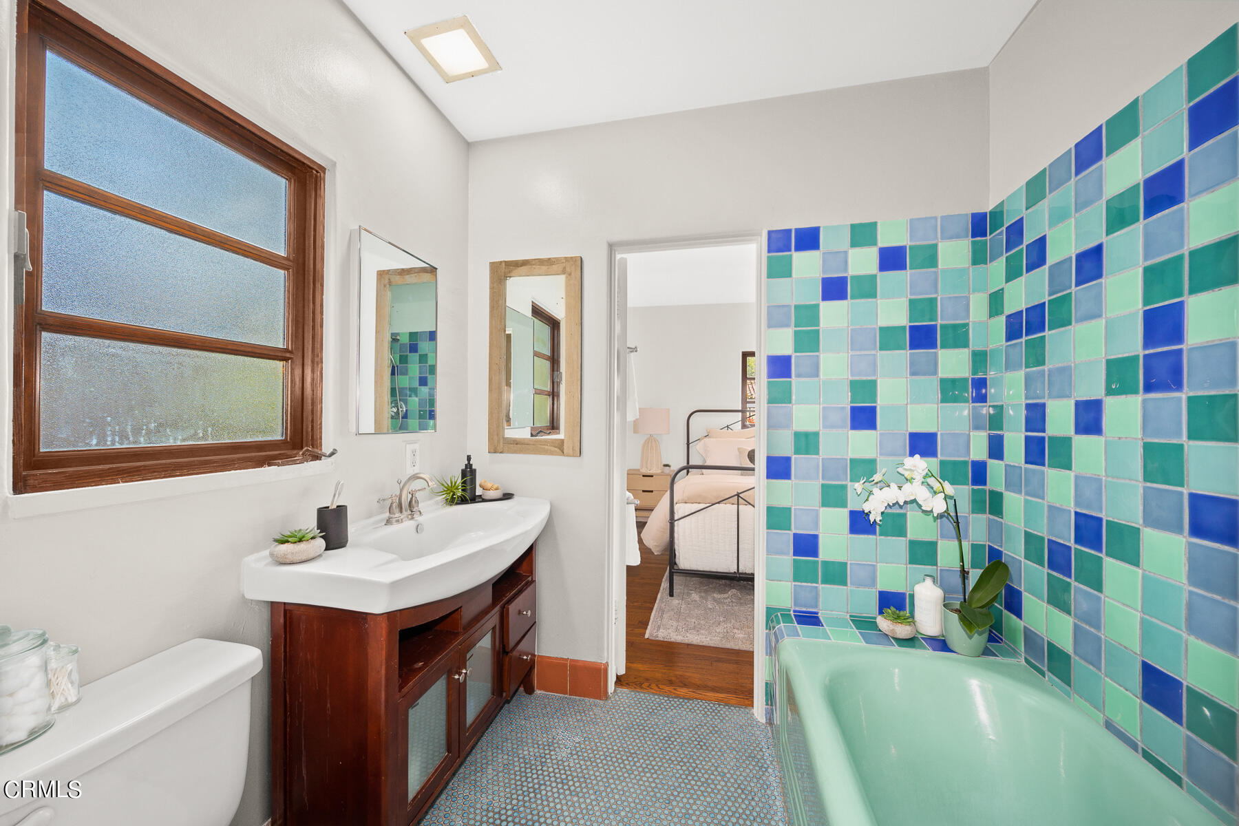 2864 Sterling Place Altadena, CA 91001 - Photo 14 of 28 a bathroom with a sink a toilet and a shower curtain