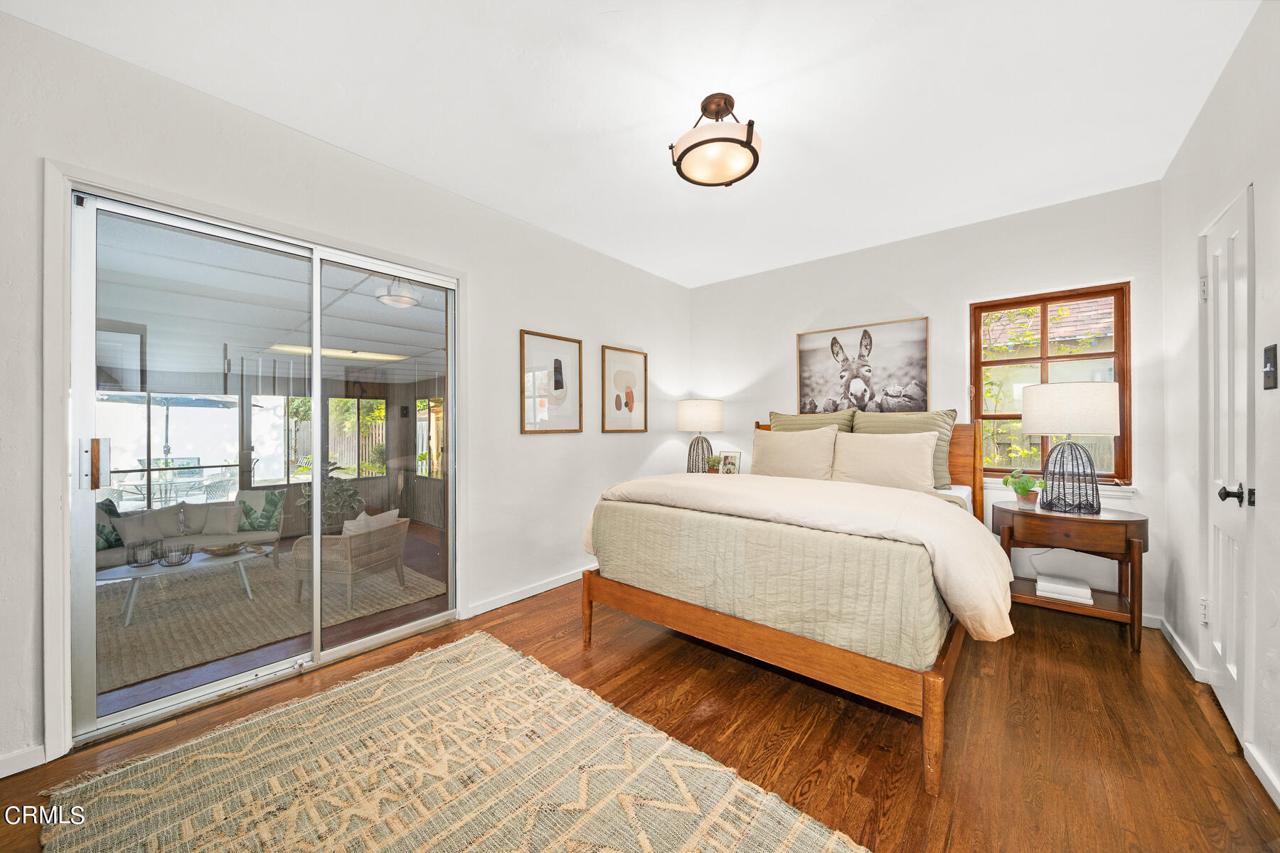 2864 Sterling Place Altadena, CA 91001 - Photo 16 of 28 a bedroom with a bed and wooden floor