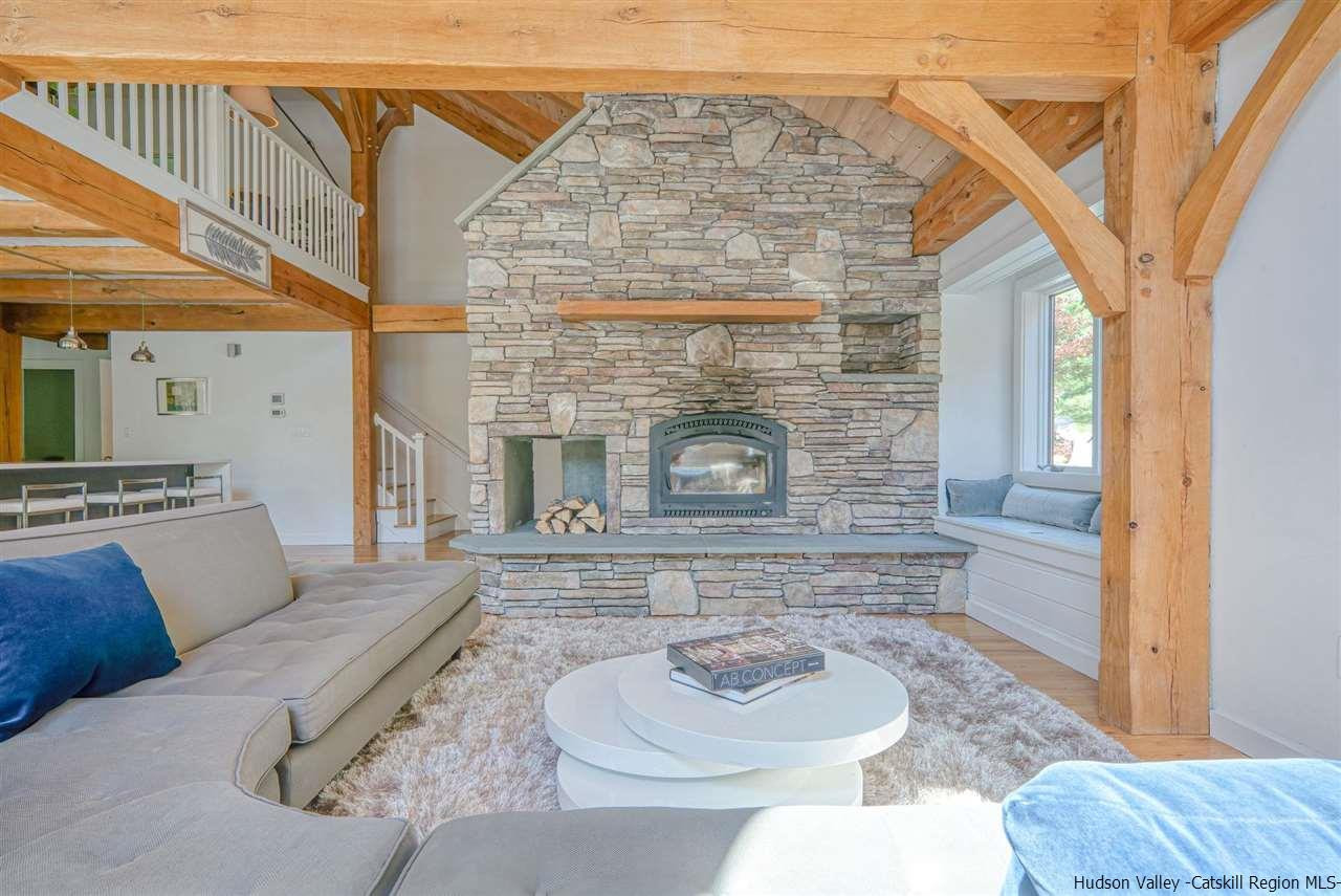 215 Sheldon Hill Road Olivebridge, NY 12461 - Photo 11 of 32 a living room with furniture and a fireplace