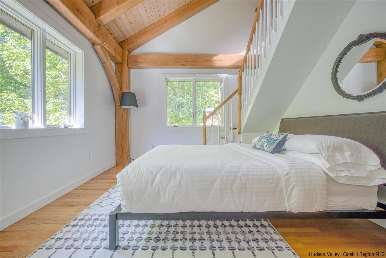 215 Sheldon Hill Road Olivebridge, NY 12461 - Photo 17 of 32 a bedroom with a bed and a window