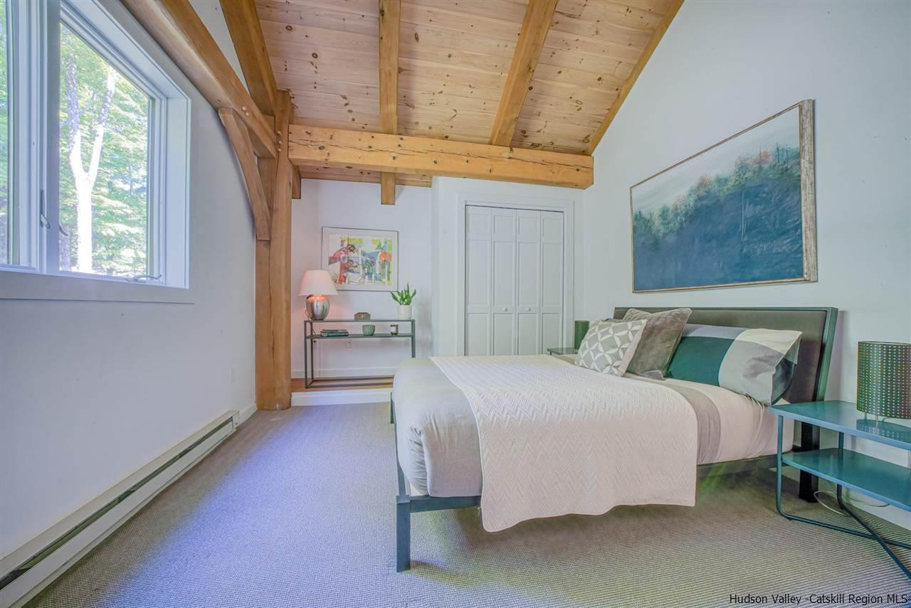 215 Sheldon Hill Road Olivebridge, NY 12461 - Photo 20 of 32 a bedroom with a bed and a window